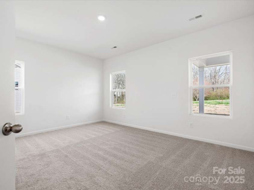 1071 Bull Dog Lane, Wingate, NC 28174.  MLS# CAR4264655, YatesRealty ID 20613. Representative Photo*Primary Bedroom