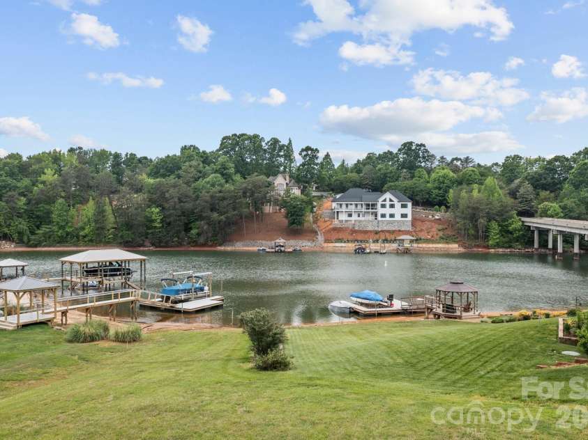 221 Windemere Isle Road, Statesville, NC 28677.  MLS# CAR4377270, YatesRealty ID 20613. Backyard, main channel waterfront, overlooking Windemere Island.