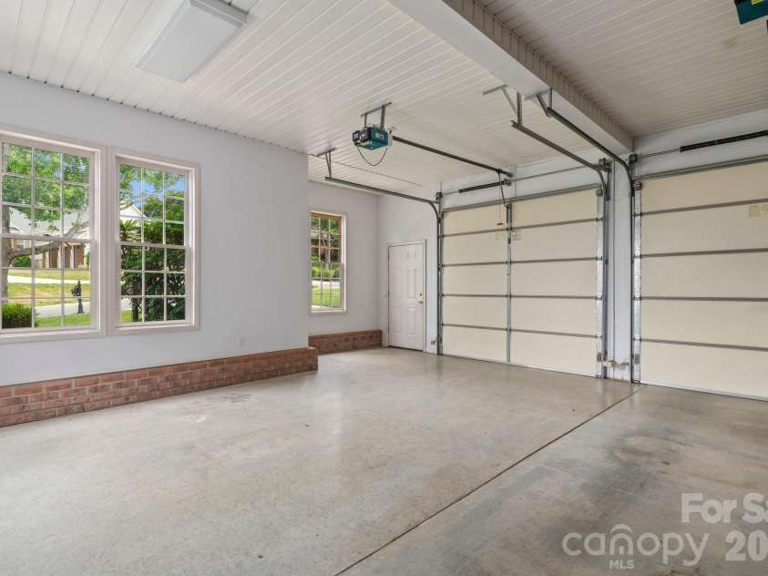 221 Windemere Isle Road, Statesville, NC 28677.  MLS# CAR4377270, YatesRealty ID 20613. Main level, side load, 2 car garage.
