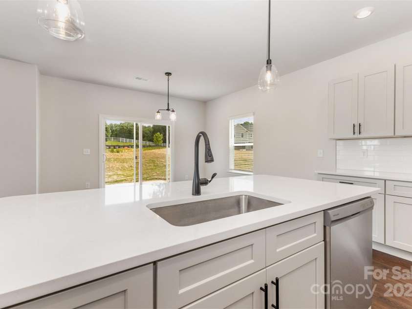 3005 Sadler Woods Lane, Charlotte, NC 28214.  MLS# CAR4272757, YatesRealty ID 20616. Gorgeous Island. Representational Photo.