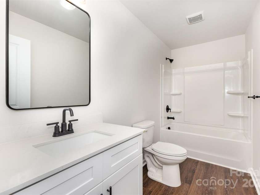 3005 Sadler Woods Lane, Charlotte, NC 28214.  MLS# CAR4272757, YatesRealty ID 20616. Secondary bathroom. Representational Photo