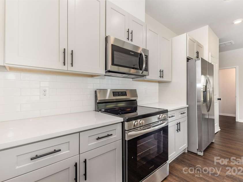 3005 Sadler Woods Lane, Charlotte, NC 28214.  MLS# CAR4272757, YatesRealty ID 20616. Stainless steel appliances. Representational Photo.