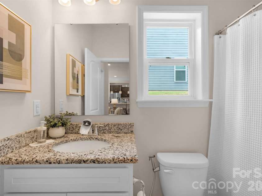 3043 Carriage Oak Way, Fort Mill, SC 29707.  MLS# CAR4374637, YatesRealty ID 20619. First floor full bathroom