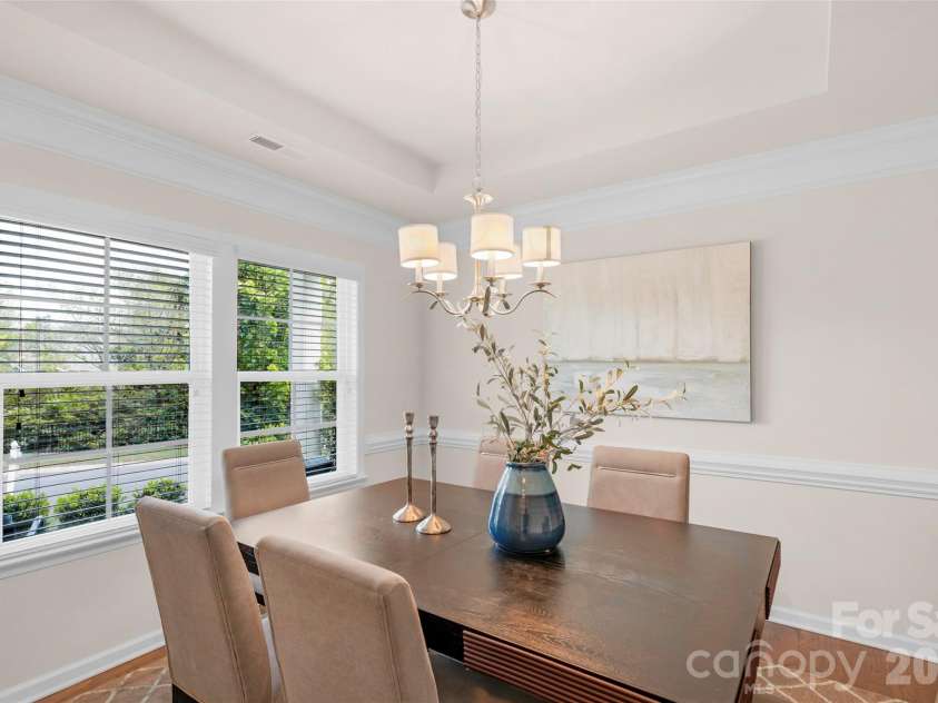3043 Carriage Oak Way, Fort Mill, SC 29707.  MLS# CAR4374637, YatesRealty ID 20619. Formal dining room wih tray ceiling