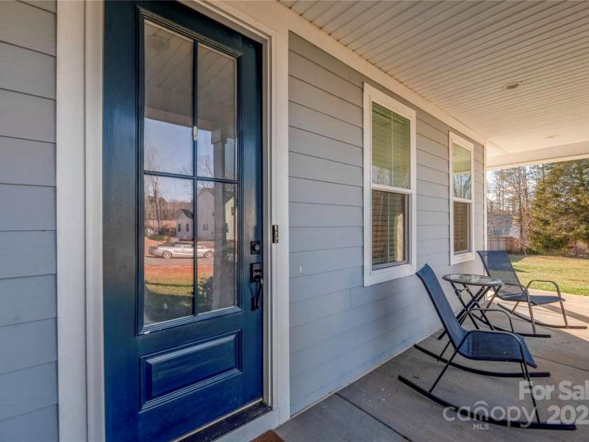 235 Goldenrod Circle, Salisbury, NC 28147.  MLS# CAR4212136, YatesRealty ID 2062. Rocking chair front porch