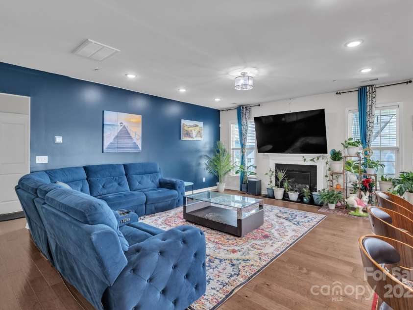 1115 Macallum Drive, Concord, NC 28027.  MLS# CAR4271321, YatesRealty ID 20626. 1st Floor - Living Room w/ Fireplace