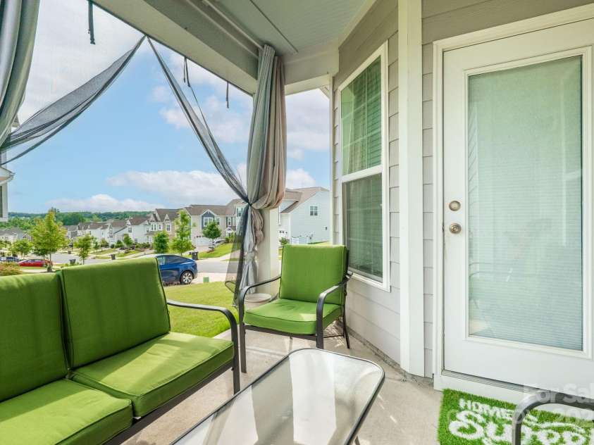 1115 Macallum Drive, Concord, NC 28027.  MLS# CAR4271321, YatesRealty ID 20626. Exterior - Covered Back Patio