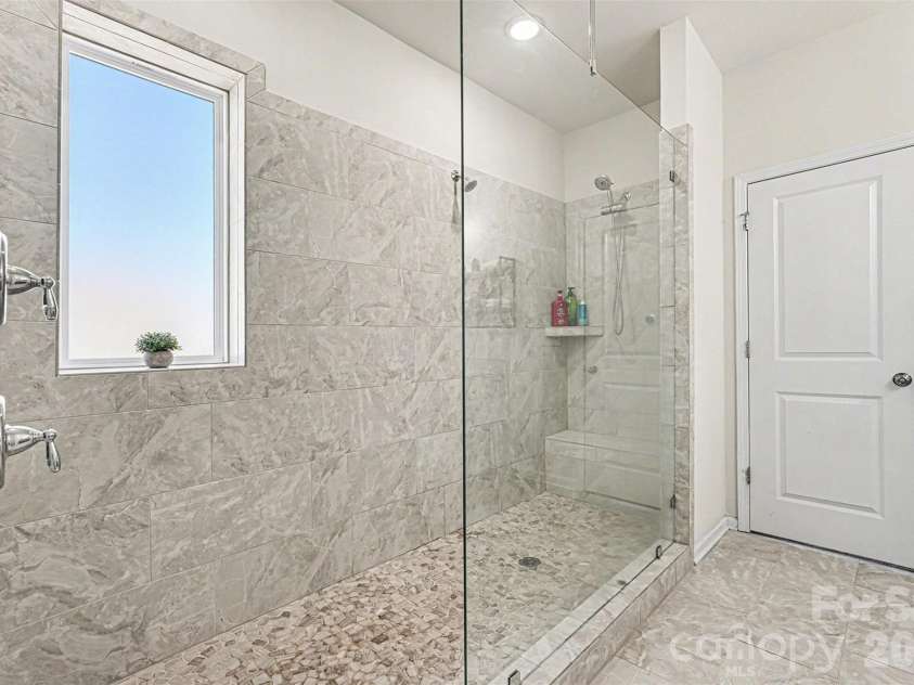 1115 Macallum Drive, Concord, NC 28027.  MLS# CAR4333035, YatesRealty ID 20626. Primary ensuite extra large tiled shower