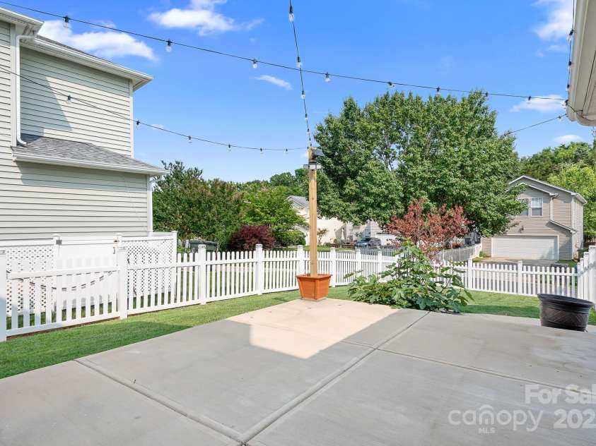14923 Almondell Drive, Huntersville, NC 28078.  MLS# CAR4264499, YatesRealty ID 20630. Fully fenced yard with patio for outdoor living