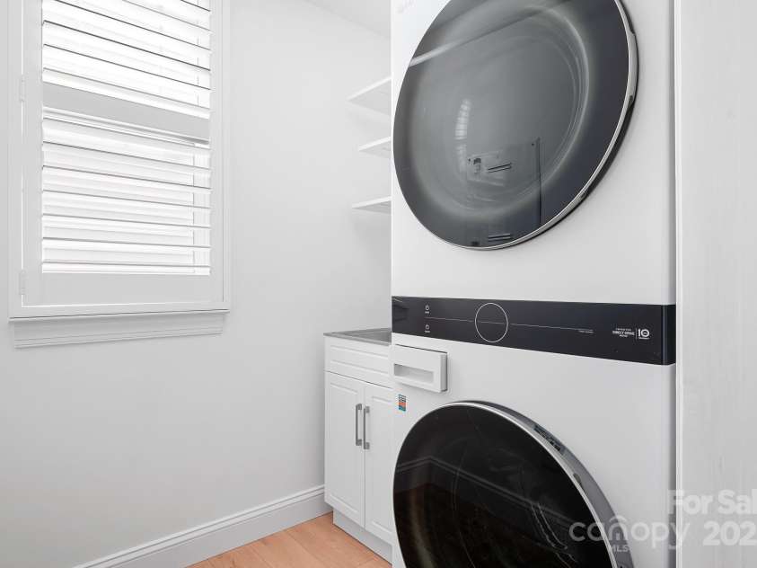 14923 Almondell Drive, Huntersville, NC 28078.  MLS# CAR4264499, YatesRealty ID 20630. Laundry Room includes sink and is located just off the kitchen.