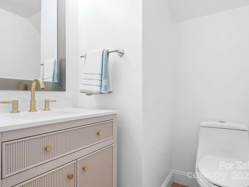 14923 Almondell Drive, Huntersville, NC 28078.  MLS# CAR4264499, YatesRealty ID 20630. Powder room updated with new vanity and toilet