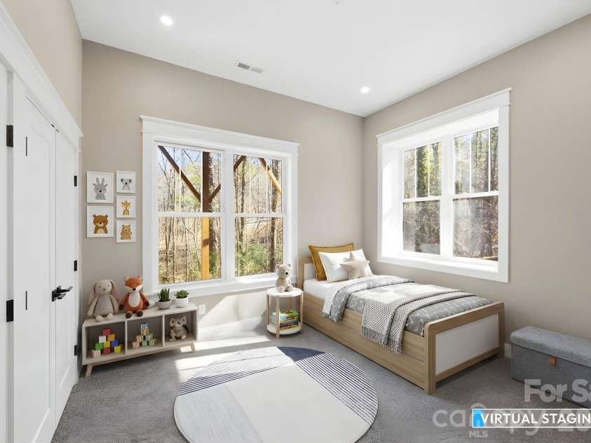 22 Deep Woods Road, Weaverville, NC 28787.  MLS# CAR4350536, YatesRealty ID 20632. Basement Bedroom