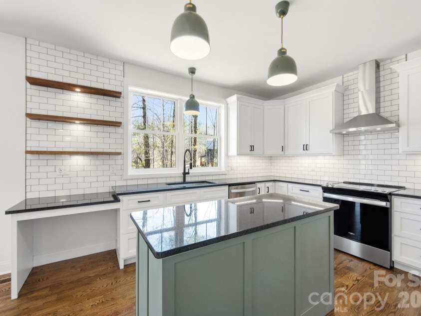 22 Deep Woods Road, Weaverville, NC 28787.  MLS# CAR4350536, YatesRealty ID 20632. Granite Countertops Throughout