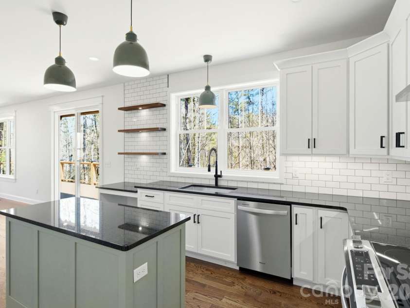 22 Deep Woods Road, Weaverville, NC 28787.  MLS# CAR4350536, YatesRealty ID 20632. Tiled Kitchen Backsplash