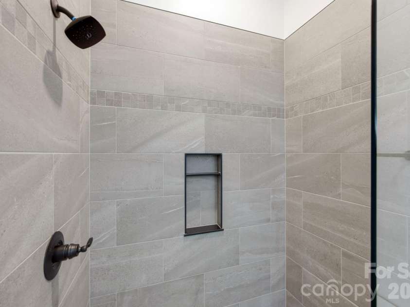 22 Deep Woods Road, Weaverville, NC 28787.  MLS# CAR4350536, YatesRealty ID 20632. Tiled Shower Surround