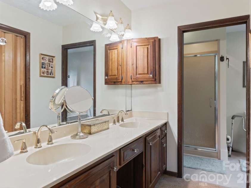 415 Reel Hollow Road, Marion, NC 28752.  MLS# CAR4380297, YatesRealty ID 20635. Owner's Suite Bathroom