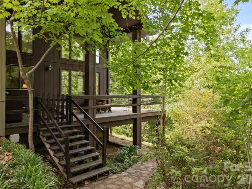 415 Reel Hollow Road, Marion, NC 28752.  MLS# CAR4380297, YatesRealty ID 20635. Side entry to rear deck