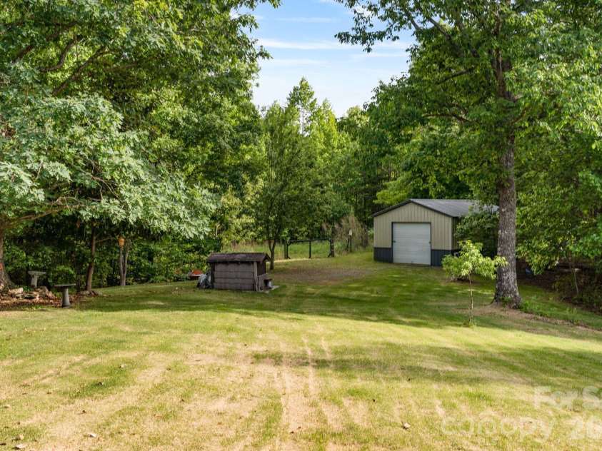 415 Reel Hollow Road, Marion, NC 28752.  MLS# CAR4380297, YatesRealty ID 20635. Yard and storage building