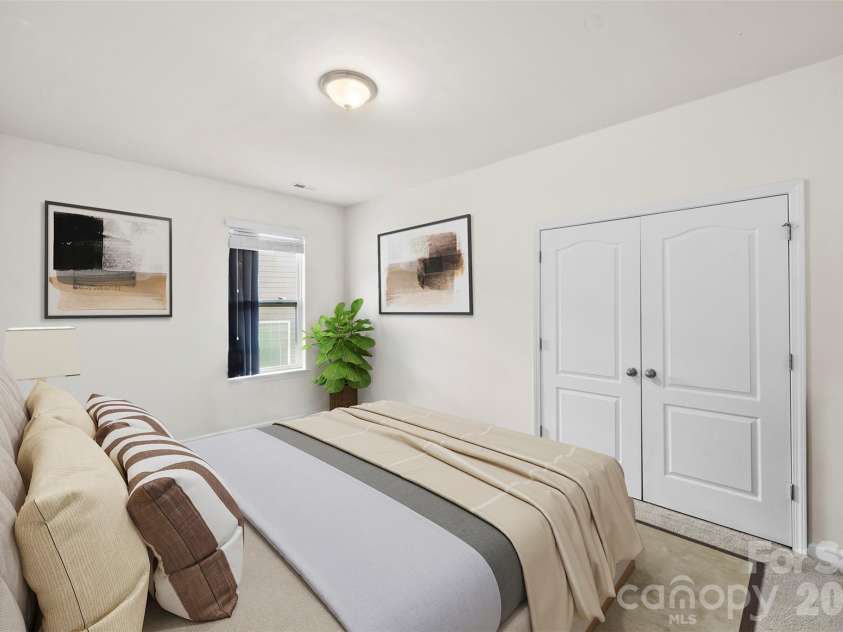 700 Wood Lily Drive, Belmont, NC 28012.  MLS# CAR4379824, YatesRealty ID 20637. Virtually staged bedroom 2 on main level