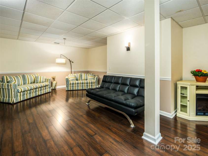 363 Rickel Drive, Hendersonville, NC 28739.  MLS# CAR4257305, YatesRealty ID 20639. Lower Level Family Room