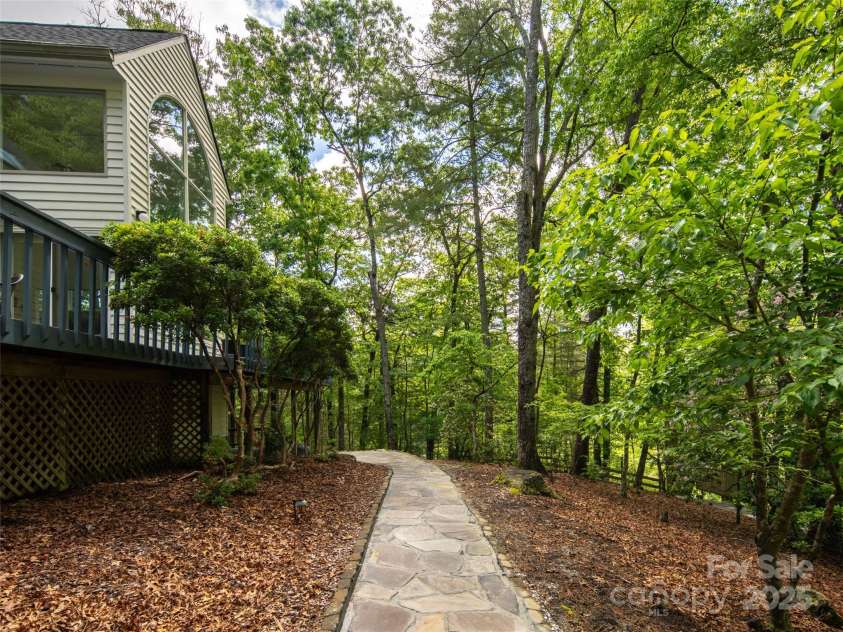 363 Rickel Drive, Hendersonville, NC 28739.  MLS# CAR4257305, YatesRealty ID 20639. Walkway to Back Patio and Deck