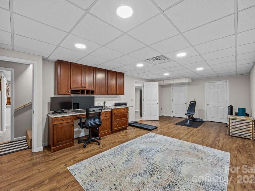 235 Petersburg View Drive, Marshall, NC 28753.  MLS# CAR4308735, YatesRealty ID 2064. Rec room in the basement