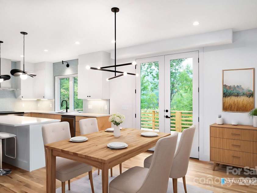 33 Windago Road, Weaverville, NC 28787.  MLS# CAR4268748, YatesRealty ID 20642. Dining Area Off of Kitchen and Deck Access