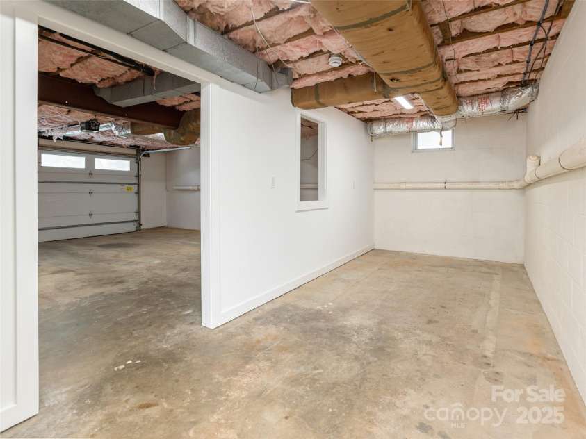 330 Balsam Road, Hendersonville, NC 28792.  MLS# CAR4261151, YatesRealty ID 20644. Workshop space in garage