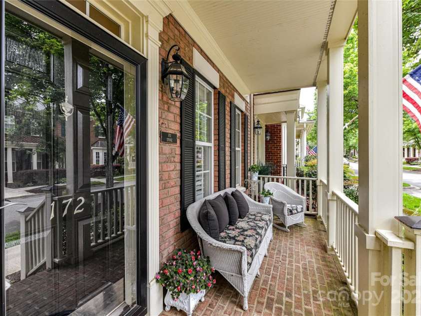 172 Harper Lee Street, Davidson, NC 28036.  MLS# CAR4249615, YatesRealty ID 20645. Covered front porch is a great place to sit and enjoy the neighborhood