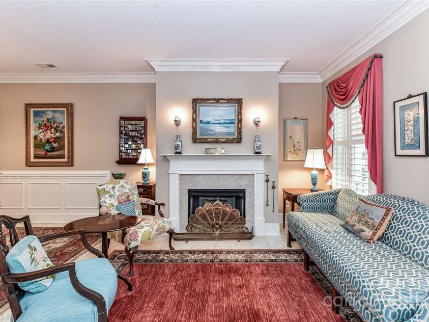 172 Harper Lee Street, Davidson, NC 28036.  MLS# CAR4249615, YatesRealty ID 20645. Enter to a formal are with large windows and beautiful woodwork details