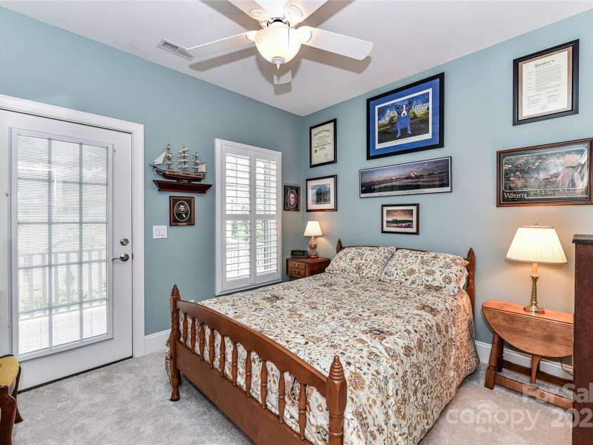 172 Harper Lee Street, Davidson, NC 28036.  MLS# CAR4249615, YatesRealty ID 20645. Second upstairs bedroom with access to the covered porch