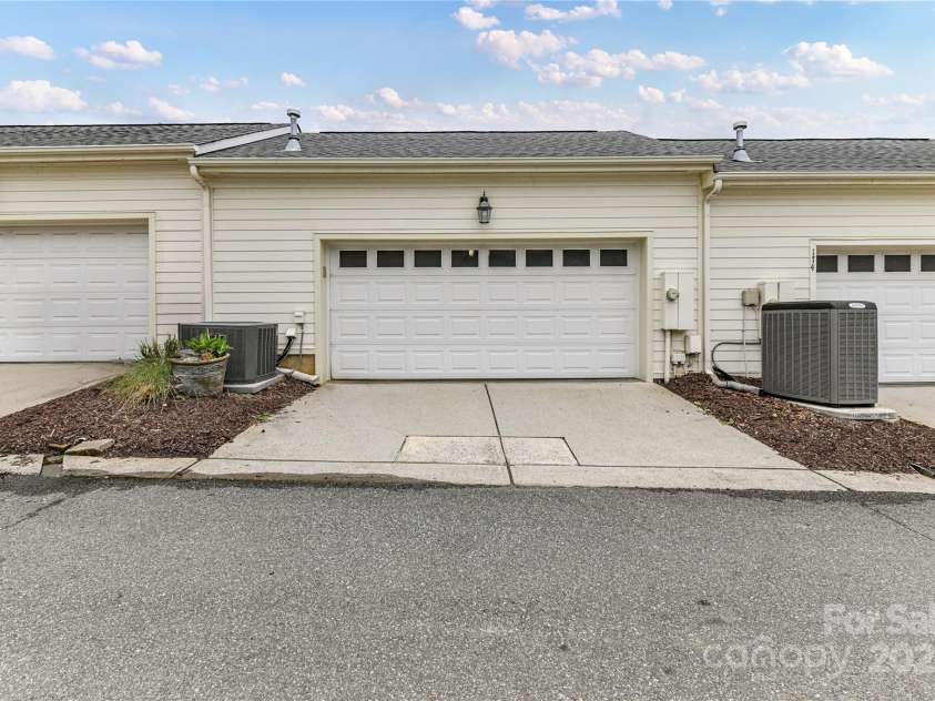 172 Harper Lee Street, Davidson, NC 28036.  MLS# CAR4249615, YatesRealty ID 20645. Two-car garage accessed through the alley