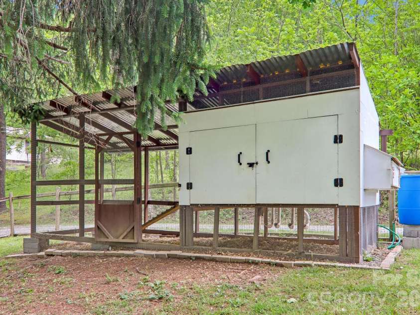 34 Lindsey Hill Lane, Zirconia, NC 28790.  MLS# CAR4376052, YatesRealty ID 20645. Chicken Coop