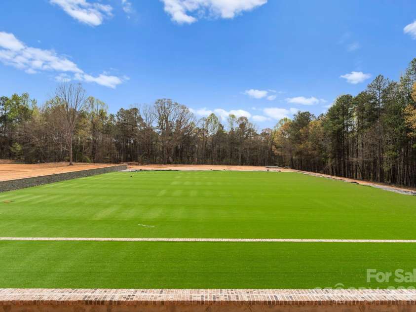 1565 Shinnville Road, Cleveland, NC 27013.  MLS# CAR4215250, YatesRealty ID 2066. Rear turf area behind event venue to host events or concerts etc.