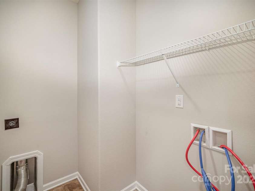 8203 Gabon Court, Charlotte, NC 28215.  MLS# CAR4233893, YatesRealty ID 2066. Laundry