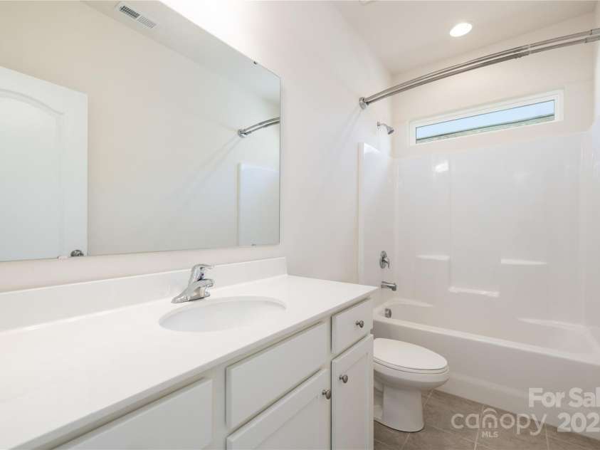 1005 Argentium Way, Waxhaw, NC 28173.  MLS# CAR4246143, YatesRealty ID 20662. Upstairs bathroom 1