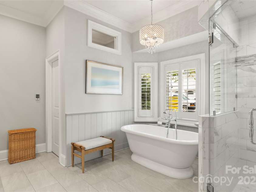 19040 Mary Ardrey Circle, Cornelius, NC 28031.  MLS# CAR4241634, YatesRealty ID 20664. Relax in the serene primary bath complete with a luxurious soaking tub