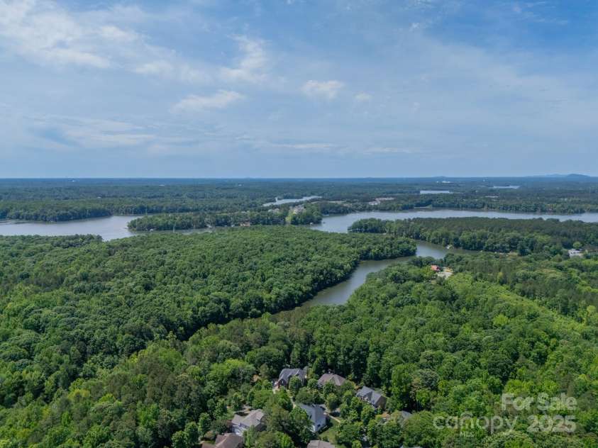 12039 Lawings Corner Drive, Huntersville, NC 28078.  MLS# CAR4256636, YatesRealty ID 20665. Aerial view of community & Latta Preserve