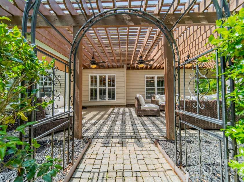 12039 Lawings Corner Drive, Huntersville, NC 28078.  MLS# CAR4256636, YatesRealty ID 20665. Back pergola