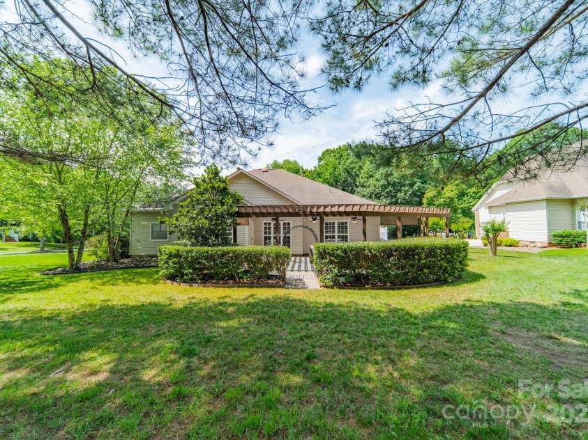 12039 Lawings Corner Drive, Huntersville, NC 28078.  MLS# CAR4256636, YatesRealty ID 20665. Backyard