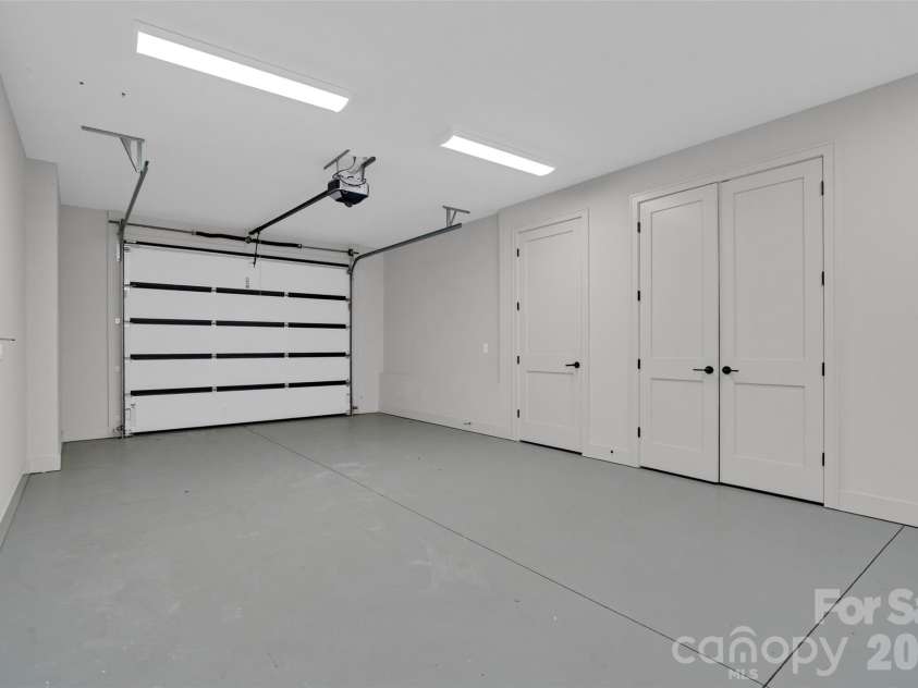 24 Copper Mill Court, Candler, NC 28715.  MLS# CAR4380494, YatesRealty ID 20665. Basement garage