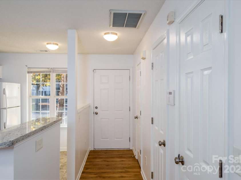 5213 Ficus Tree Lane, Charlotte, NC 28215.  MLS# CAR4318376, YatesRealty ID 2067. Front door