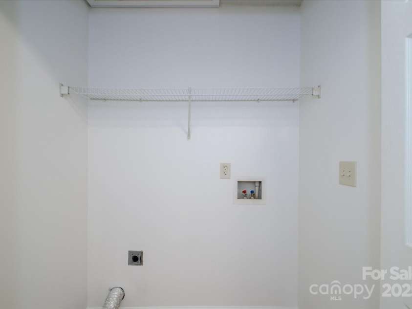 5213 Ficus Tree Lane, Charlotte, NC 28215.  MLS# CAR4318376, YatesRealty ID 2067. Laundry Closet