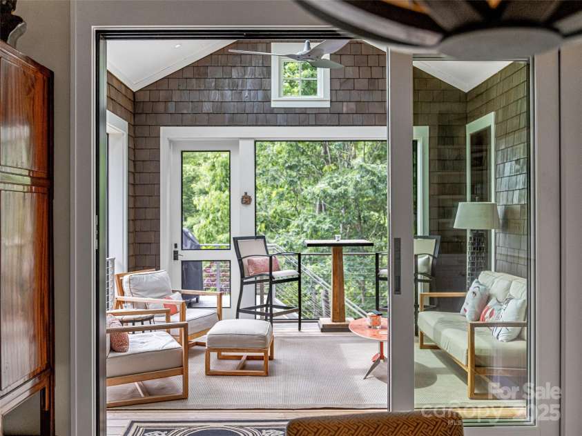 3 Bayonne Trail, Asheville, NC 28804.  MLS# CAR4262687, YatesRealty ID 20673. Masterfully designed screened porch