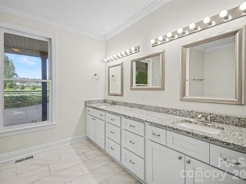 6285 Ridge Road, Clover, SC 29710.  MLS# CAR4373386, YatesRealty ID 20673. Primary Bathroom Angle 1