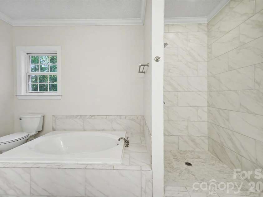 6285 Ridge Road, Clover, SC 29710.  MLS# CAR4373386, YatesRealty ID 20673. Primary Bathroom Angle 2