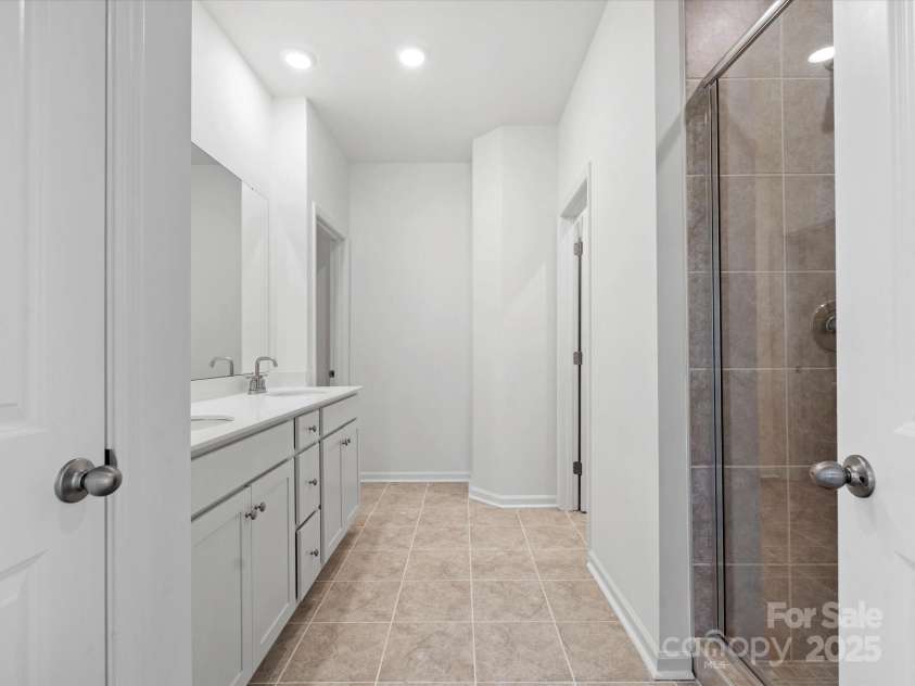 1074 Bull Dog Lane, Wingate, NC 28174.  MLS# CAR4264623, YatesRealty ID 20675. Representative Photo* Primary bath