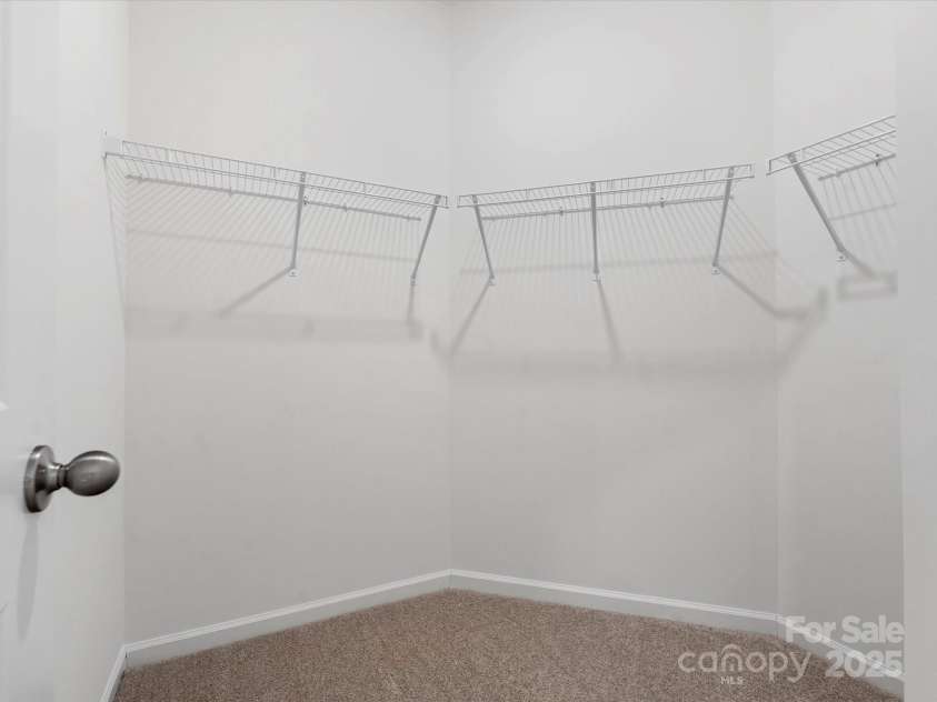 1074 Bull Dog Lane, Wingate, NC 28174.  MLS# CAR4264623, YatesRealty ID 20675. Representative Photo* Primary Closet