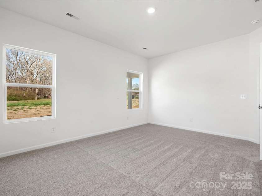 1074 Bull Dog Lane, Wingate, NC 28174.  MLS# CAR4264623, YatesRealty ID 20675. Representative Photo*Primary Bedroom