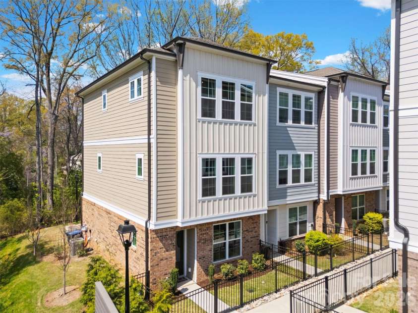 3225 Zenith Lane, Charlotte, NC 28205.  MLS# CAR4361849, YatesRealty ID 20683. Corner lot, end-unit backing to trees!
